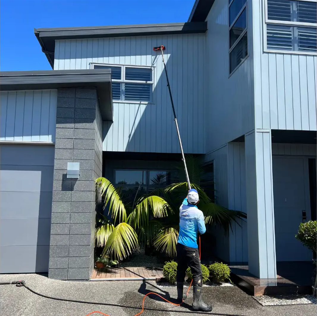 Soft wash low-pressure technique applied to a South Florida tile roof